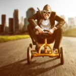 marketing mindscape man racing on toy car