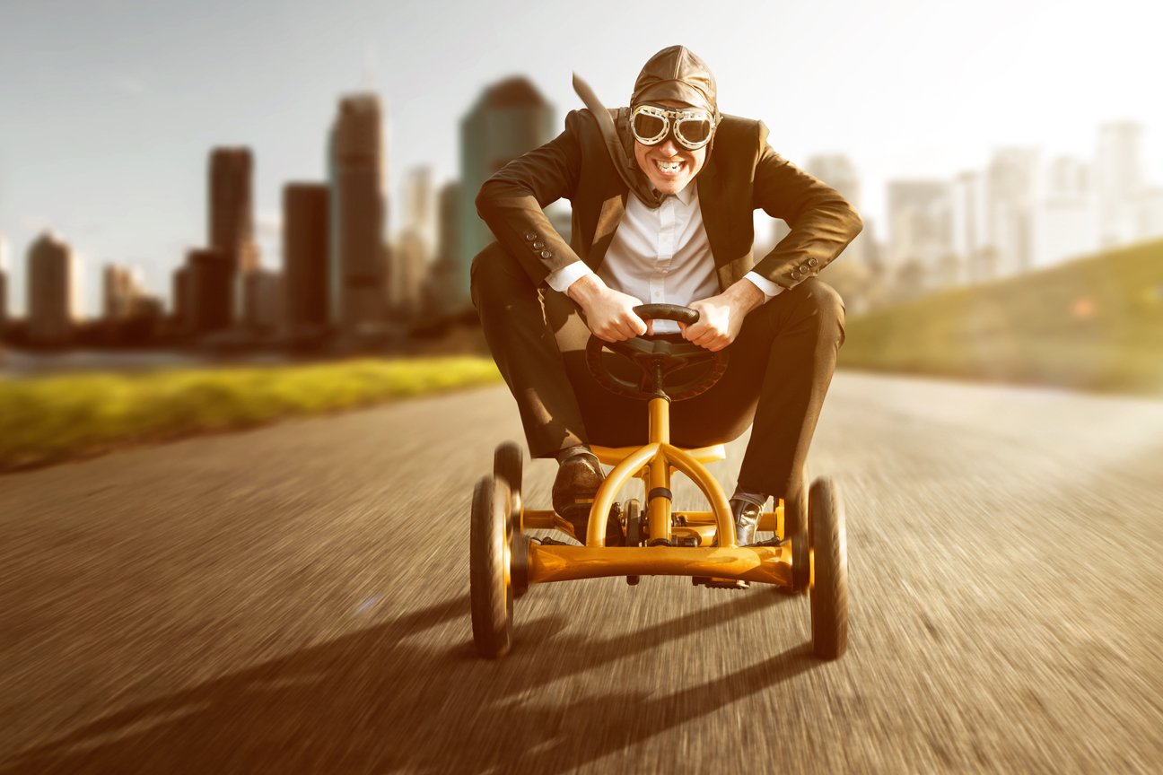 marketing mindscape man racing on toy car